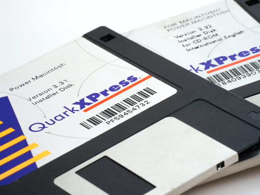 A photo of two 3.5" floppy disks.